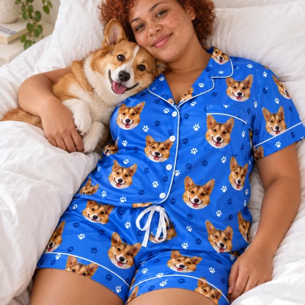 Woman in bridal pajamas cuddling her corgi — MyDogPics