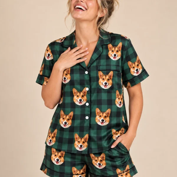 Woman wearing bridal pajamas covered in tan-and-white corgi faces on green plaid satin — MyDogPics