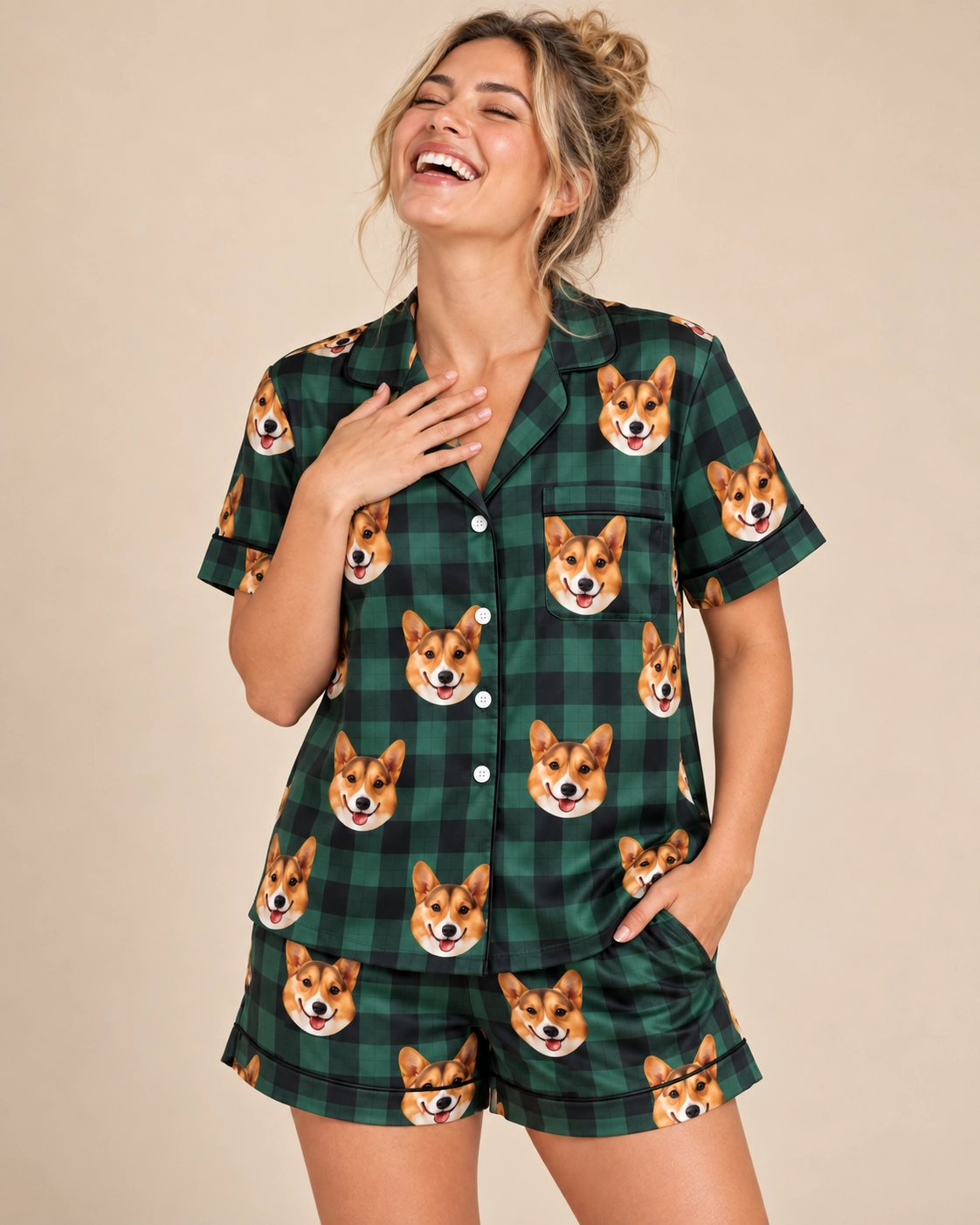 Bridal Pajamas – Front View, Green Plaid | MyDogPics Woman wearing bridal pajamas covered in tan-and-white corgi faces on green plaid satin — MyDogPics