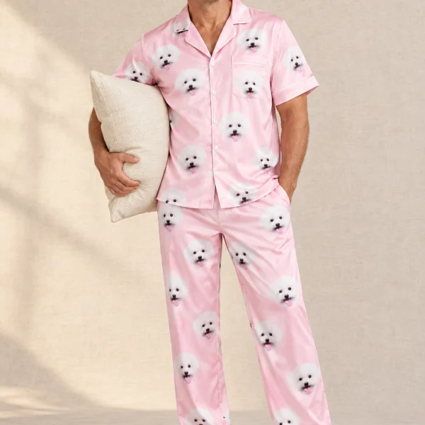 Man wearing a button up pajama set covered in white Pomeranian faces on blush pink satin — MyDogPics