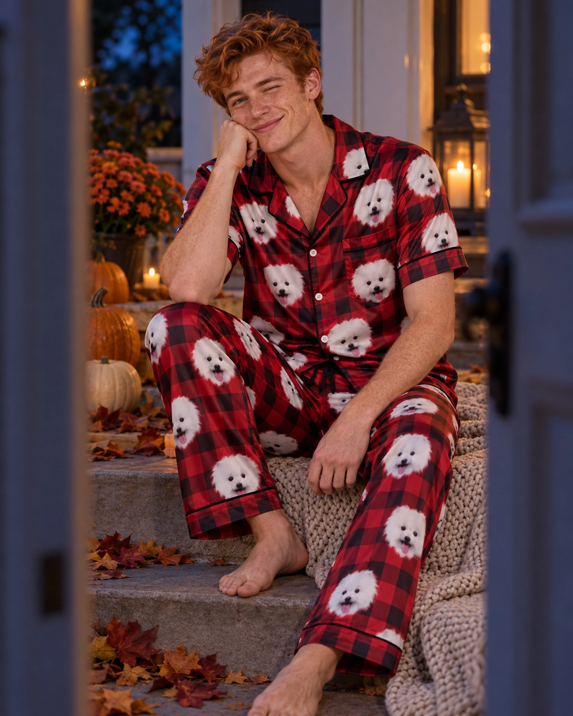 Button Up Pajama Set – Sitting, Red Plaid | MyDogPics Man sitting in a button up pajama set covered in white Pomeranian faces — MyDogPics