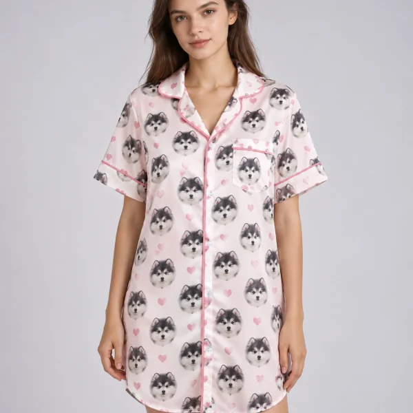 Woman wearing a custom nightgown covered in fluffy black-and-white puppy faces on blush pink satin with hearts — MyDogPics