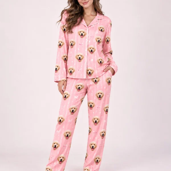 Woman posing in custom satin pajamas, golden retriever puppy faces on pink satin with small bows — MyDogPics