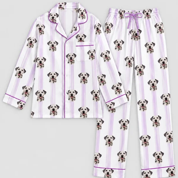 Flat lay of Dalmatian pajamas: shirt and pants covered in Dalmatian faces — MyDogPics