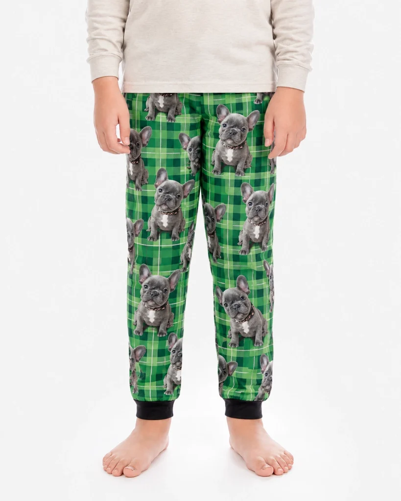 Close-up of the dog pajamas for kids print: grey French bulldog faces on green plaid — MyDogPics