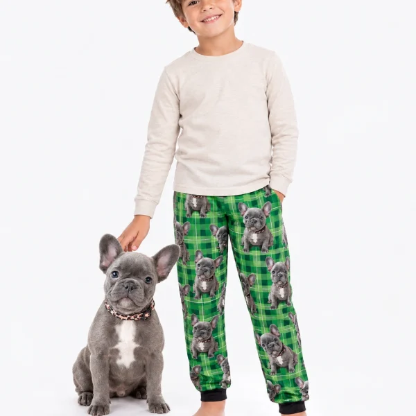 Boy in a dog pajamas for kids standing next to his French bulldog — MyDogPics