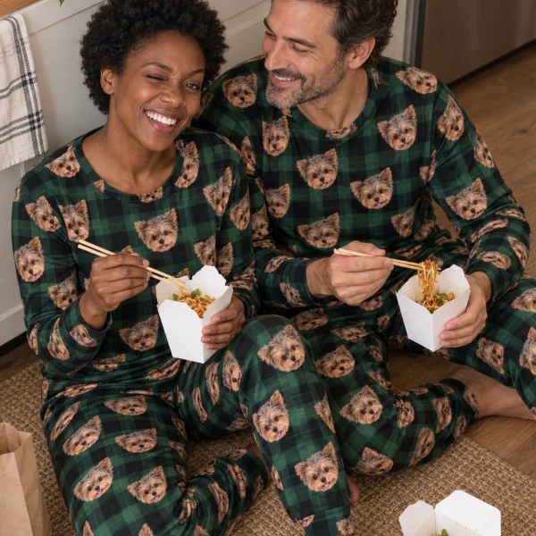Woman and her partner in matching fall pajamas with Yorkshire terrier faces on green plaid fabric — MyDogPics