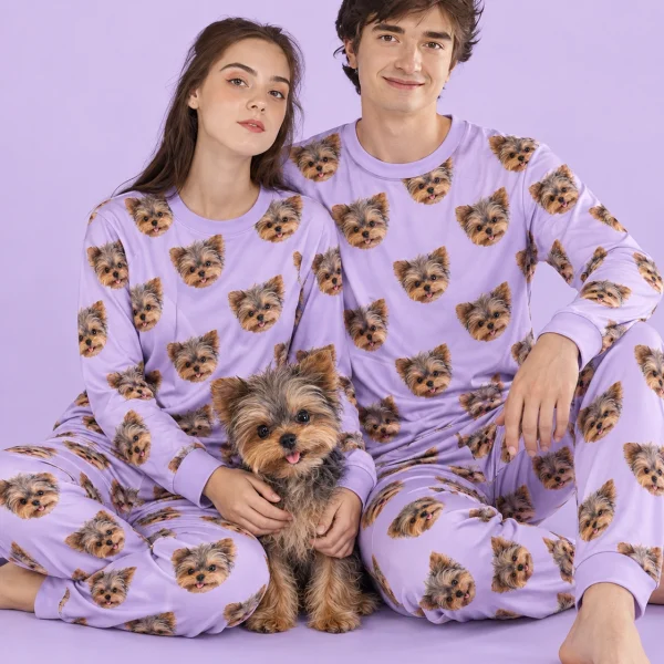 Couple in family matching pajamas with their Yorkshire terrier — MyDogPics