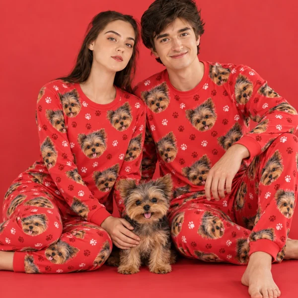 Couple in family matching pajamas with their Yorkshire terrier — MyDogPics