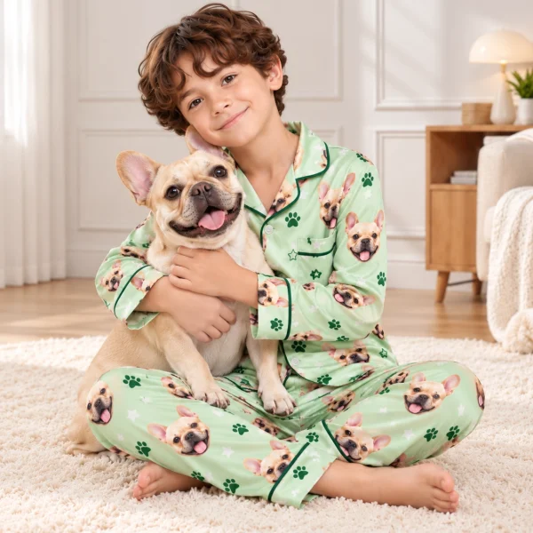 Boy in French bulldog jammies holding his French bulldog — MyDogPics