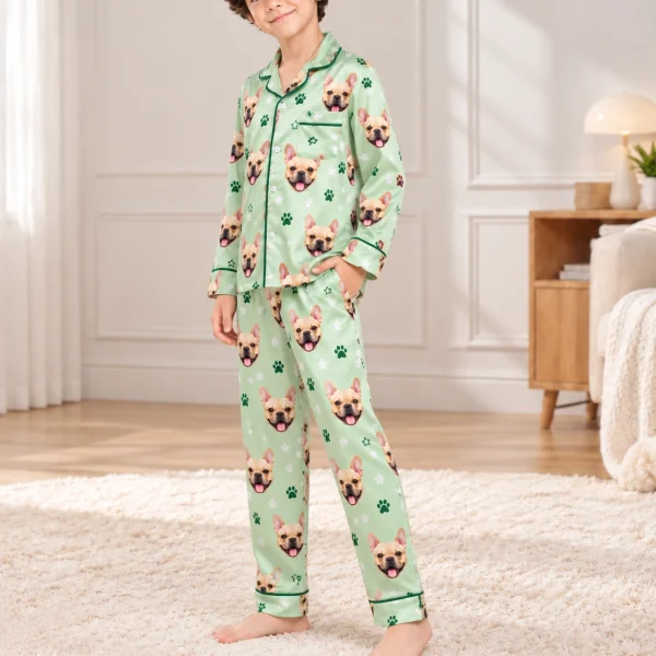 Side view of French bulldog jammies with fawn French bulldog faces on sage green satin with paw prints — MyDogPics