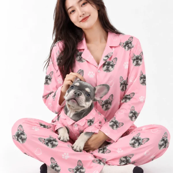 Woman in French bulldog pajamas cuddling her French bulldog — MyDogPics