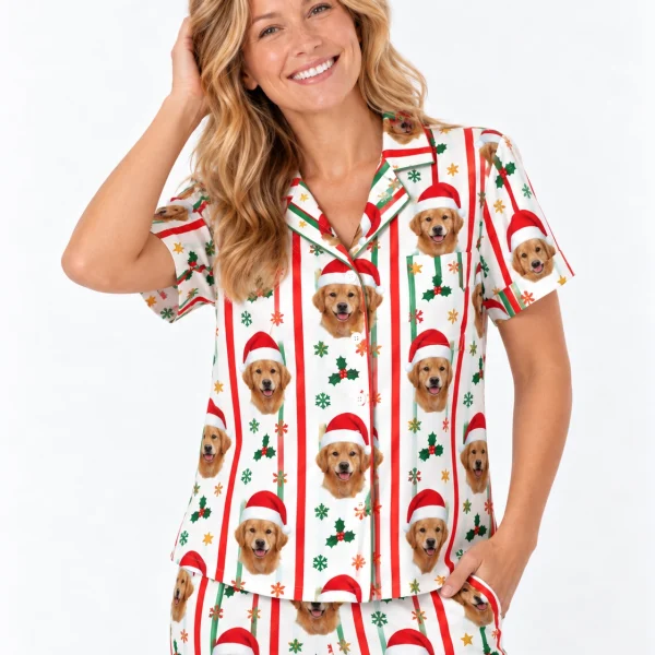 Close-up of the golden retriever Christmas pajamas print with golden retriever faces in Santa hats — MyDogPics