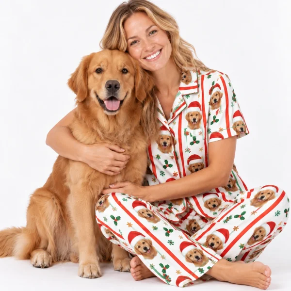 Woman in golden retriever Christmas pajamas cuddling her golden retriever — MyDogPics