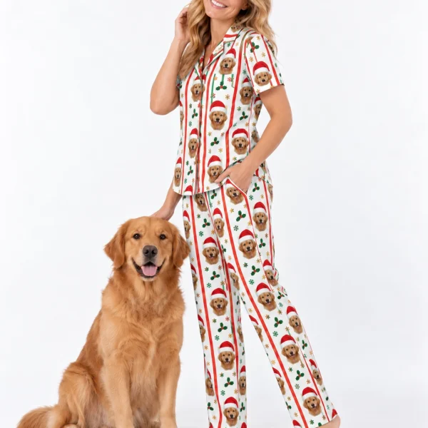 Woman in golden retriever Christmas pajamas standing next to her golden retriever — MyDogPics