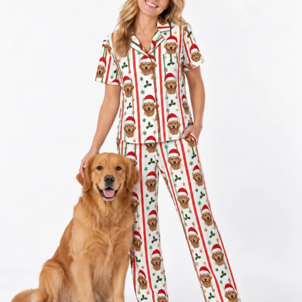 Woman in golden retriever Christmas pajamas standing next to her golden retriever — MyDogPics