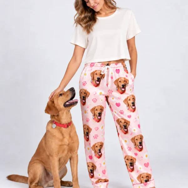 Woman in golden retriever pajama pants standing next to her golden retriever — MyDogPics