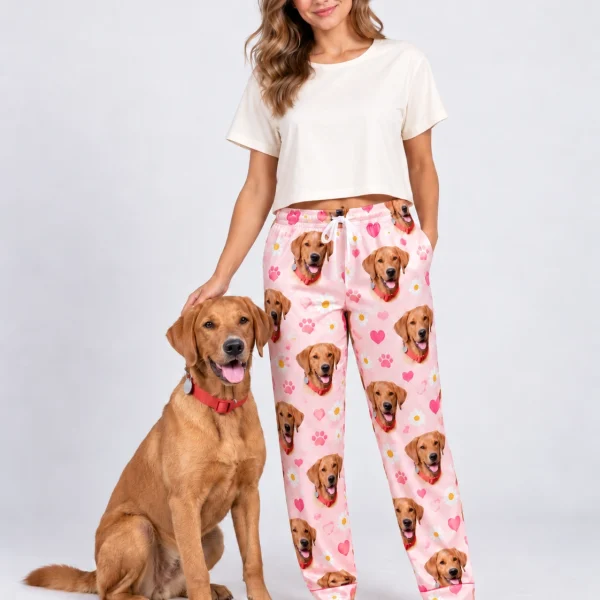 Woman in golden retriever pajama pants standing next to her golden retriever — MyDogPics
