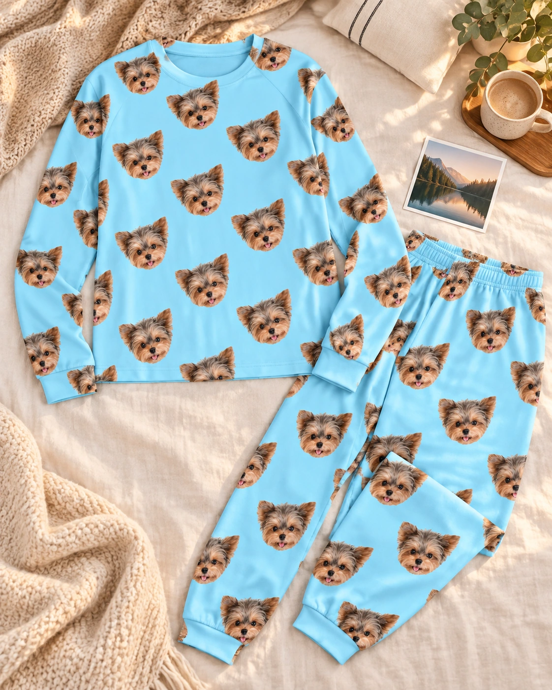 Holiday Pajamas – Flat Lay, Light Blue | MyDogPics Flat lay of holiday pajamas: top and pants covered in Yorkshire terrier faces — MyDogPics