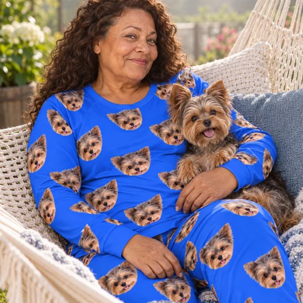Woman in holiday pajamas with her Yorkshire terrier — MyDogPics
