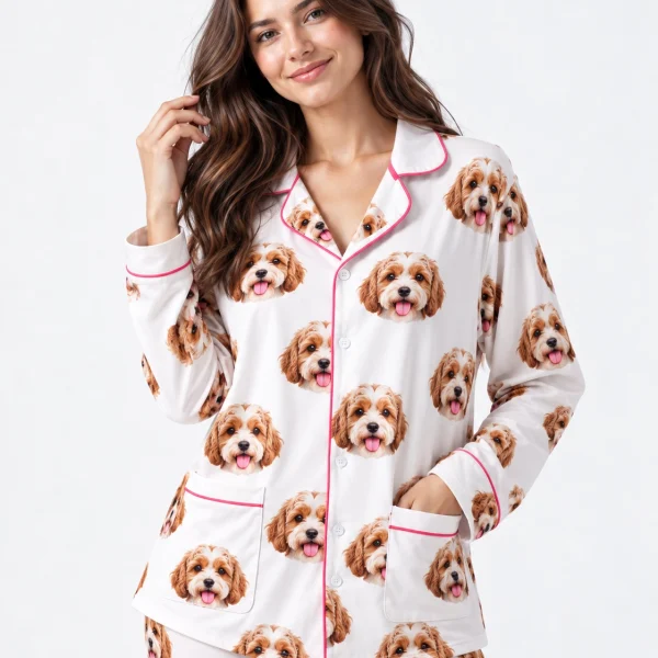 Close-up of the long sleeve pajamas print: doodle puppy faces on white fabric with contrast piping — MyDogPics