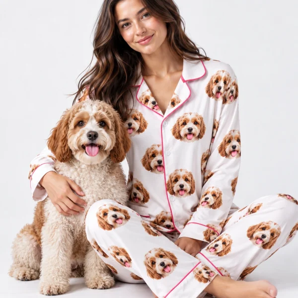 Woman in long sleeve pajamas cuddling her doodle puppy — MyDogPics