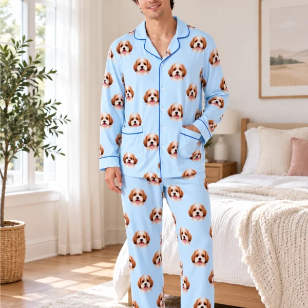 Man wearing long sleeve pajamas covered in doodle puppy faces on light blue fabric with contrast piping — MyDogPics