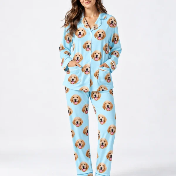 Woman wearing long sleeve pajamas covered in doodle puppy faces on light blue fabric with contrast piping — MyDogPics
