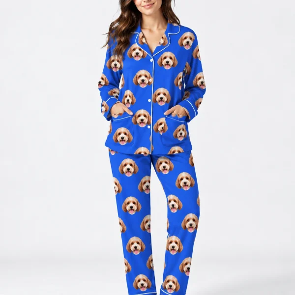 Woman wearing long sleeve pajamas covered in doodle puppy faces on royal blue fabric with contrast piping — MyDogPics