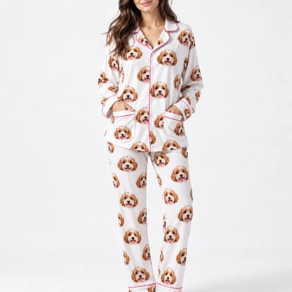 Woman wearing long sleeve pajamas covered in doodle puppy faces on white fabric with contrast piping — MyDogPics