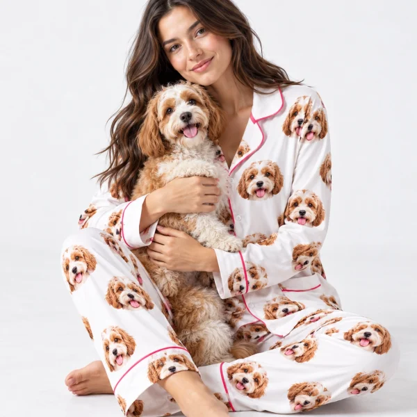 Woman in long sleeve pajamas holding her doodle puppy — MyDogPics