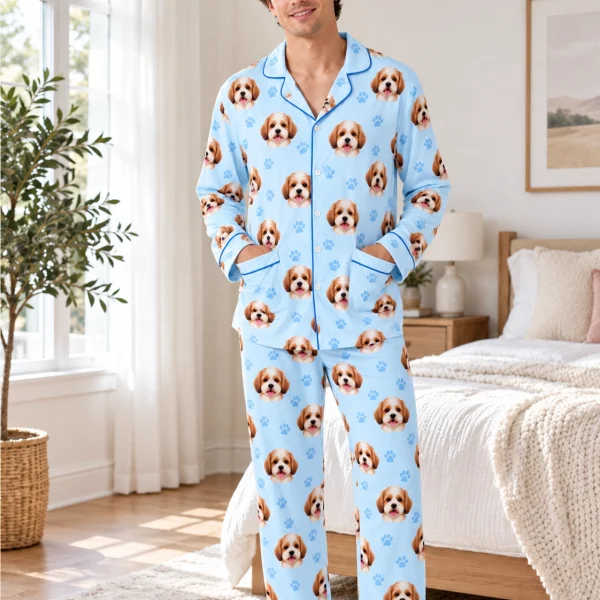 Man posing in long sleeve pajamas, doodle puppy faces on light blue fabric with contrast piping — MyDogPics