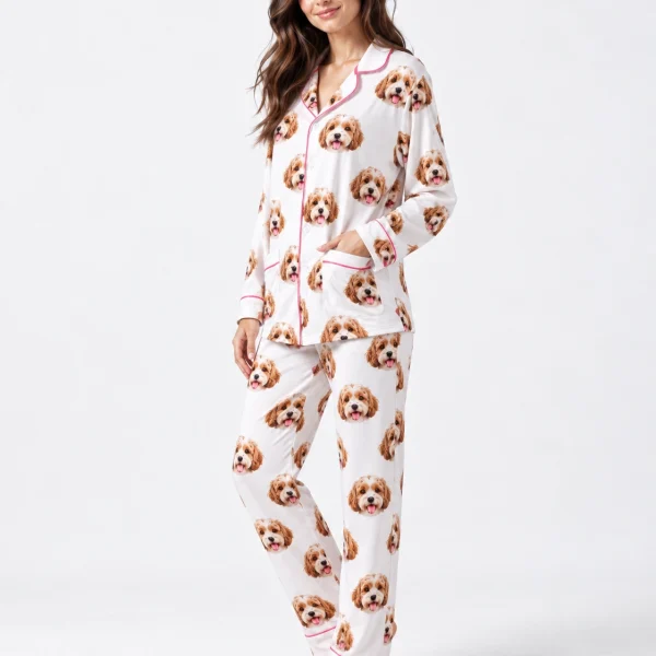 Side view of long sleeve pajamas with doodle puppy faces on white fabric with contrast piping — MyDogPics