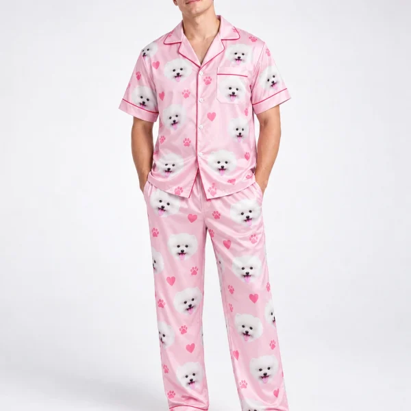 Man wearing matching couple pajamas covered in white Pomeranian faces — MyDogPics