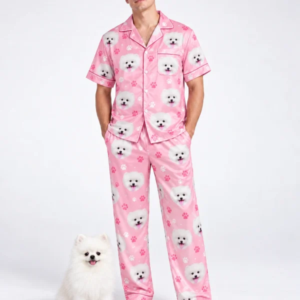 Man in matching couple pajamas standing next to his Pomeranian — MyDogPics
