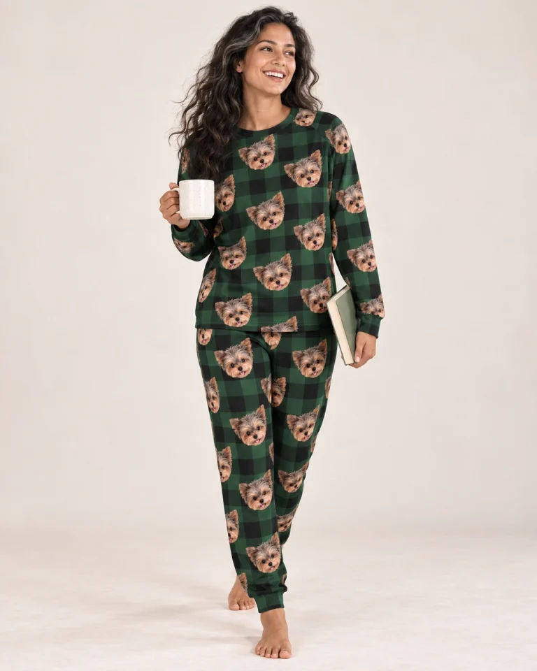Woman posing in matching pajamas, Yorkshire terrier faces on green plaid fabric — MyDogPics