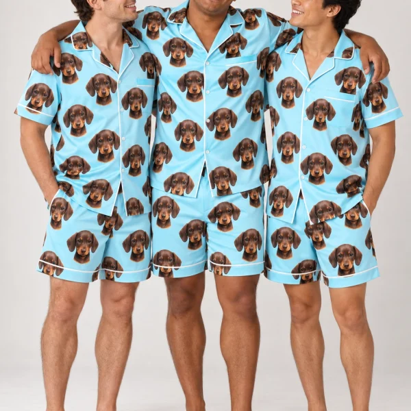 Man and friends in matching men PJs with brown dachshund puppy faces on light blue satin — MyDogPics