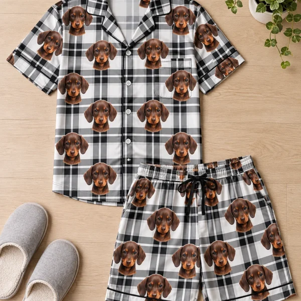 Flat lay of a mens pajama set: shirt and shorts covered in brown dachshund puppy faces — MyDogPics