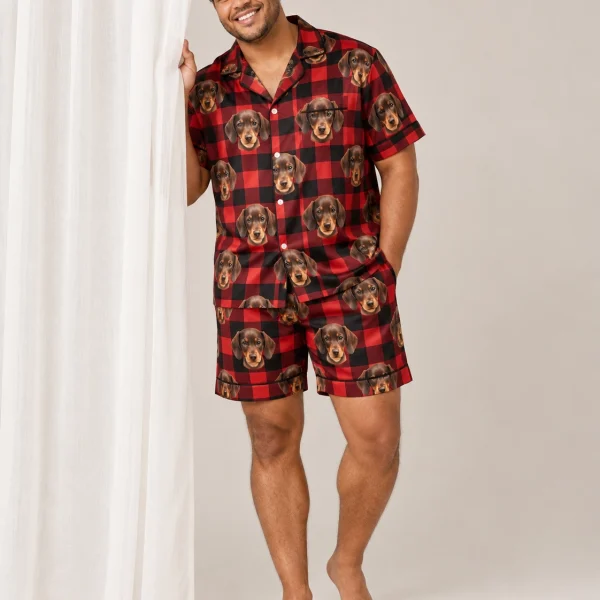 Man wearing a mens pajama set covered in brown dachshund puppy faces on red plaid satin — MyDogPics