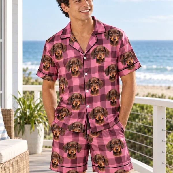 Man wearing mens pajama shorts covered in brown dachshund puppy faces on pink plaid satin — MyDogPics