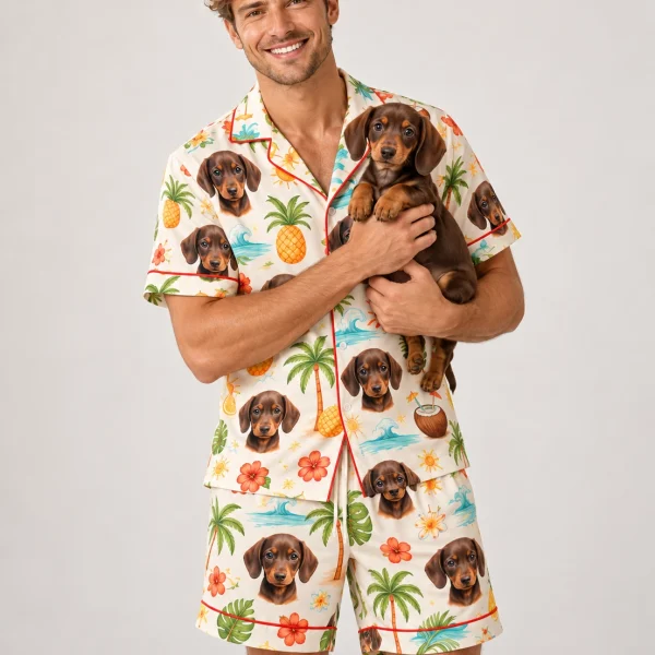 Man in a mens pajama shorts set holding his dachshund puppy — MyDogPics