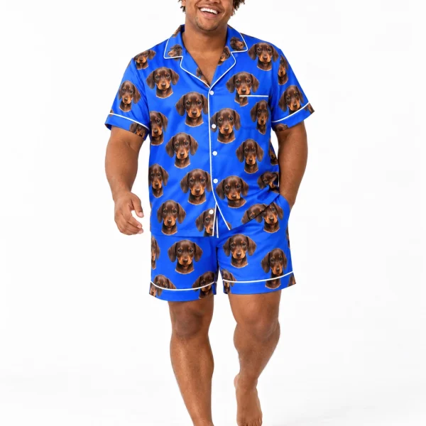 Man posing in mens pajamas, brown dachshund puppy faces on royal blue satin — MyDogPics