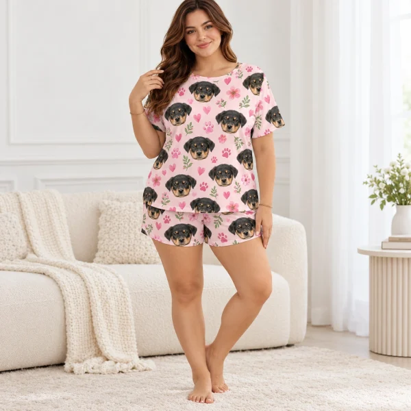 Woman wearing a pajama short set covered in Rottweiler puppy faces — MyDogPics