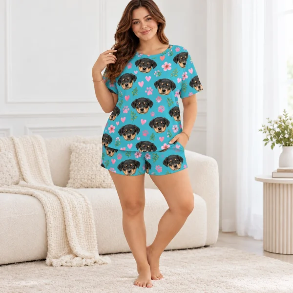 Woman wearing a pajama short set covered in Rottweiler puppy faces — MyDogPics