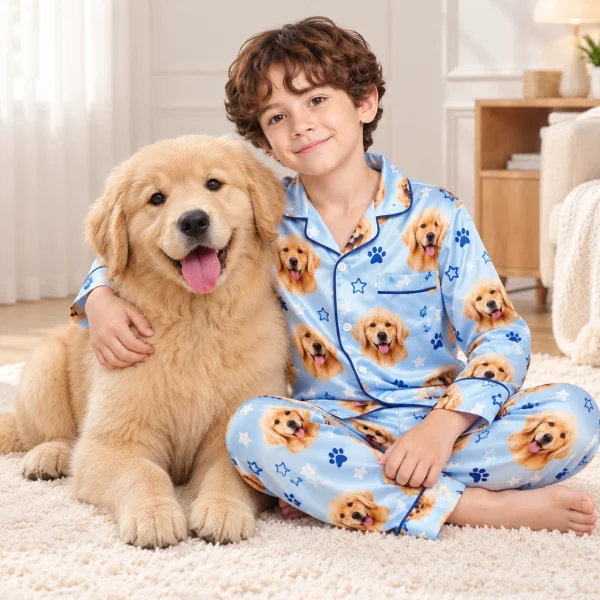 Boy in a personalized pajamas for kids cuddling his golden retriever — MyDogPics