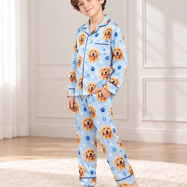 Side view of a personalized pajamas for kids with golden retriever faces on sky blue satin with stars — MyDogPics