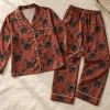 A french bulldog's face printed all over personalized satin pajamas for women — MyDogPics