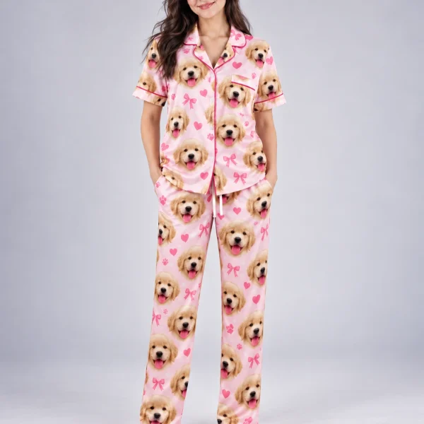 Woman posing in personalized satin pajamas, golden retriever puppy faces on pink satin with bows and hearts — MyDogPics