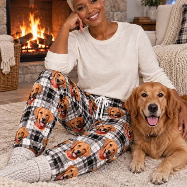 Woman in pink pajama pants with her golden retriever — MyDogPics