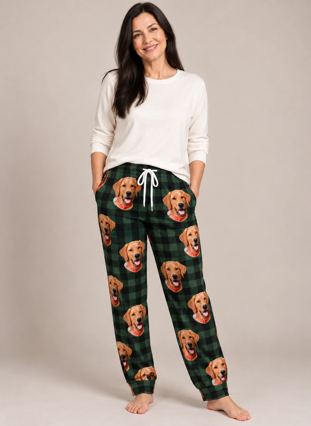 Plaid Pajama Pants – Front View, Green Plaid | MyDogPics Woman wearing plaid pajama pants covered in golden retriever faces on green plaid fabric — MyDogPics